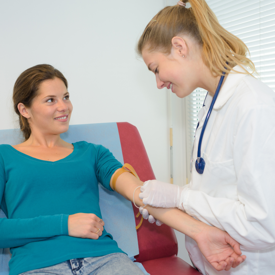 Woman having a diagnostics test done in-clinic
